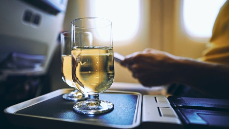 Why You Should Avoid Alcohol Before a Nap on the Plane